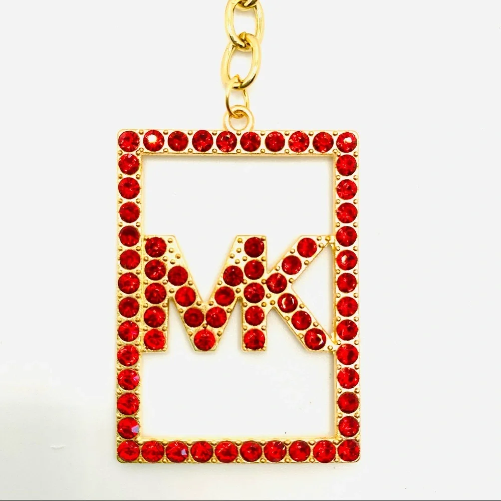 Purse Charm Key Chain MK in Red Crystals set in golden tone.